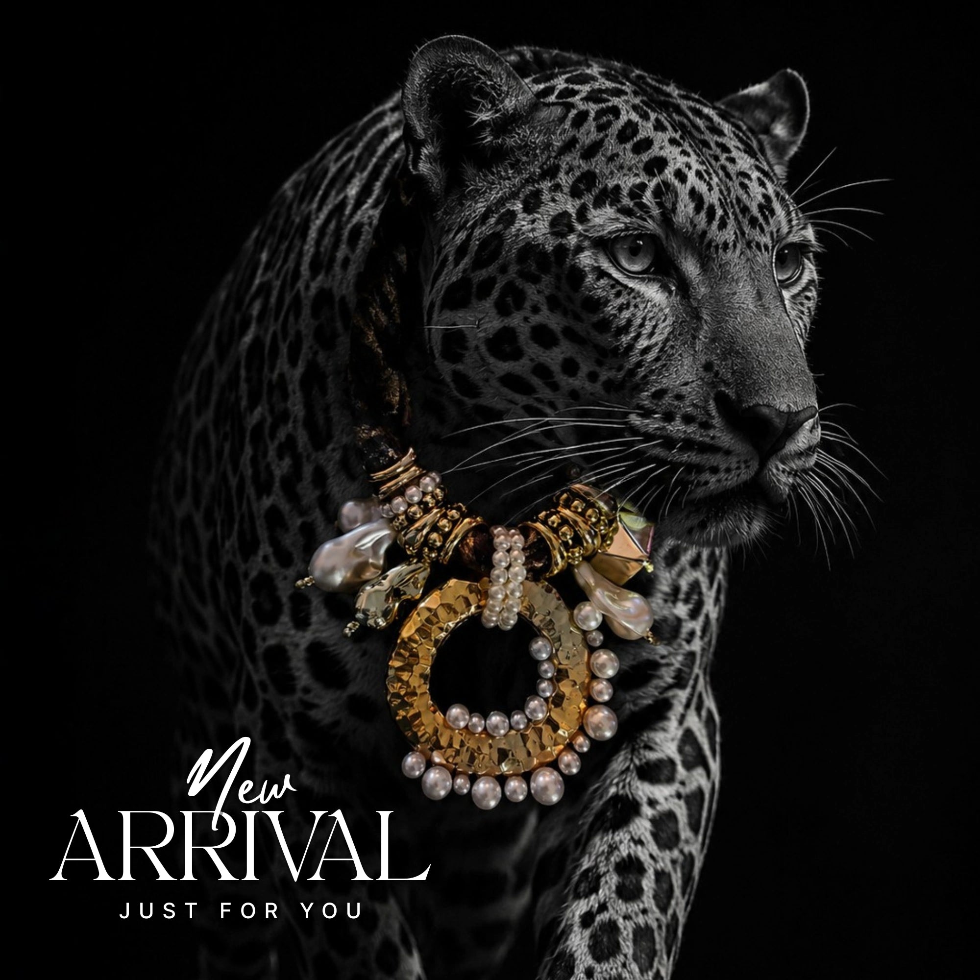 A close-up studio portrait of a leopard wearing an ornate gold and pearl necklace against a black background, with the text 'New ARRIVAL JUST FOR YOU' in the lower left.